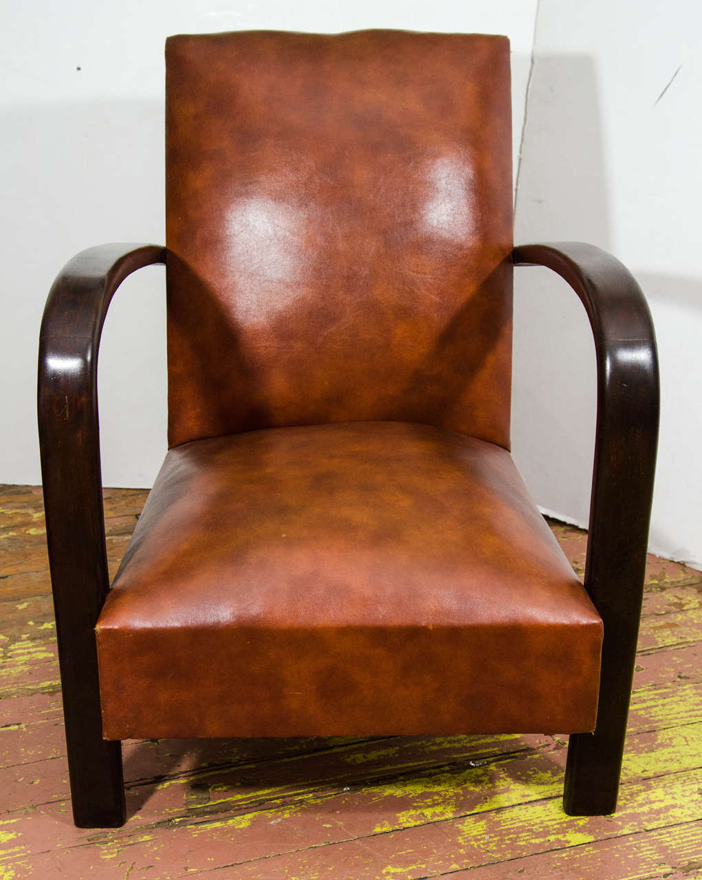 Pair of hoop armchairs reupholstered in leather.